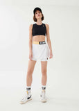 P.E NATION SHORT BACKSWING SKIRT IN WHITE