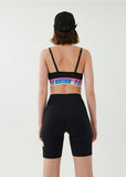 P.E NATION BRA HALF VOLLEY SPORTS BRA IN BLACK